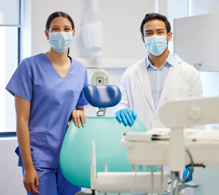 portrait of a young dentist and his assistant work 2023 11 27 05 06 07 utc